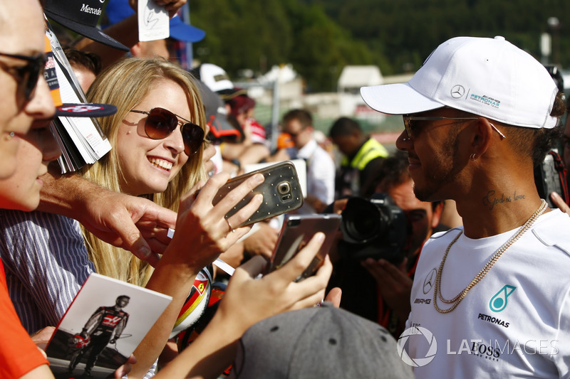 Lewis Hamilton, Mercedes AMG F1, signs autographs for fans