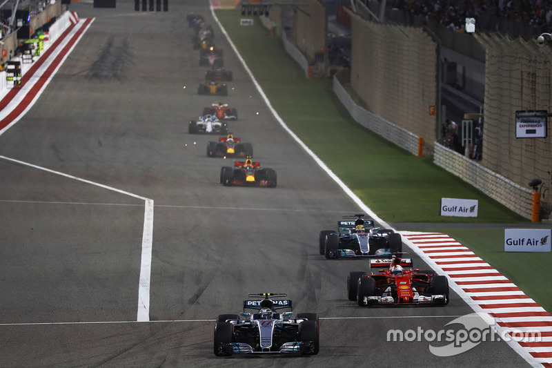 Valtteri Bottas, Mercedes AMG F1 W08, leads Sebastian Vettel, Ferrari SF70H, and Lewis Hamilton, Mercedes AMG F1 W08