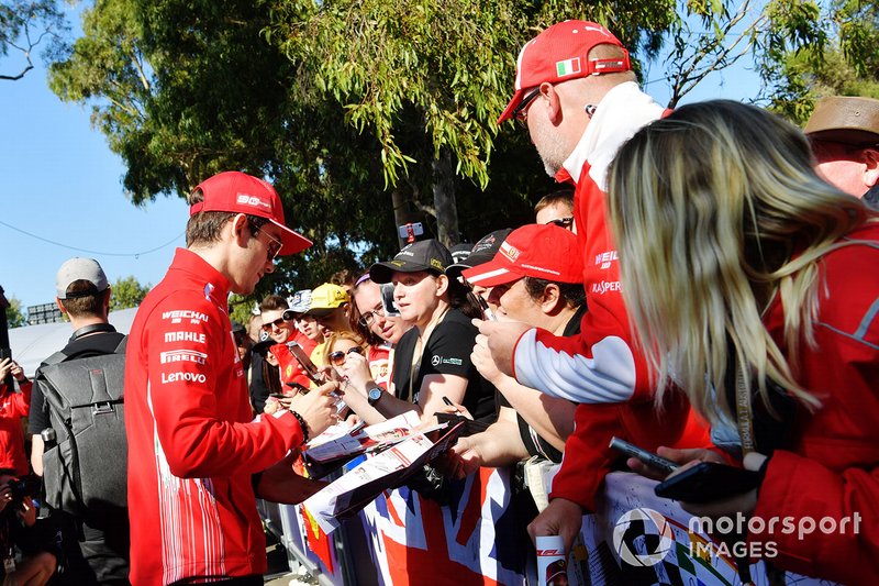 Charles Leclerc, Ferrari, signs an autograph