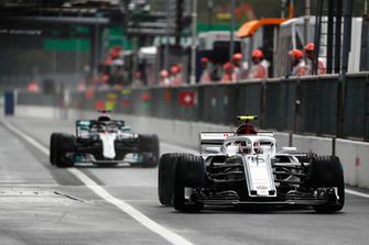 Charles Leclerc, Sauber C37, leads Lewis Hamilton, Mercedes AMG F1 W09