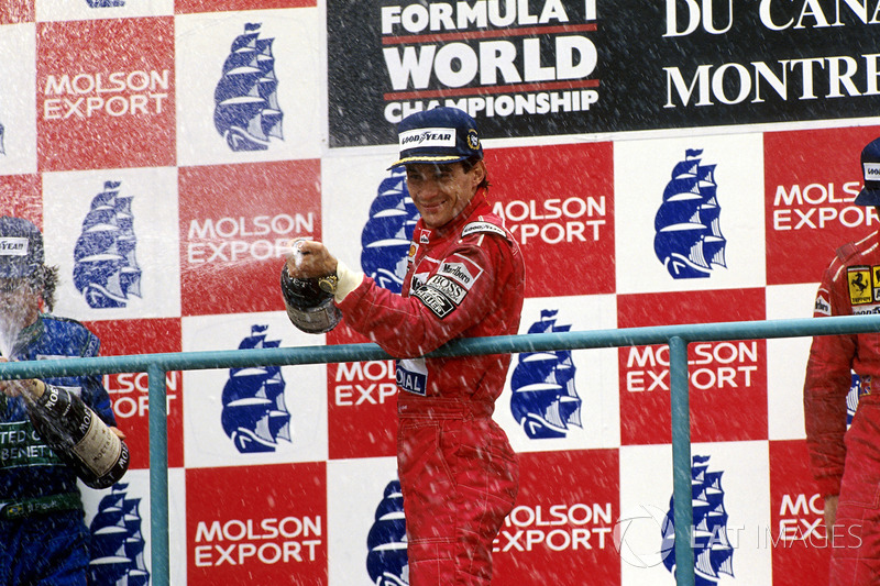 Podium: race winner Ayrton Senna, McLaren, second place Nelson Piquet, Benetton, third place Nigel M