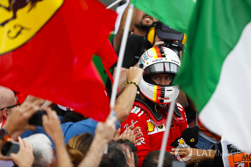 Sebastian Vettel, Ferrari, merayakan kemenangan