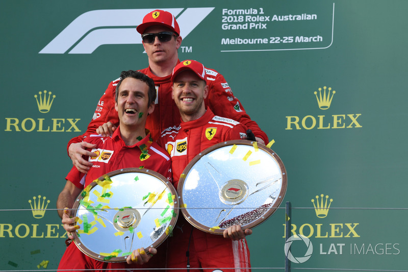 Inaki Rueda, Ferrari Race Strategist, Sebastian Vettel, Ferrari and Kimi Raikkonen, Ferrari celebrate on the podium with the trophies