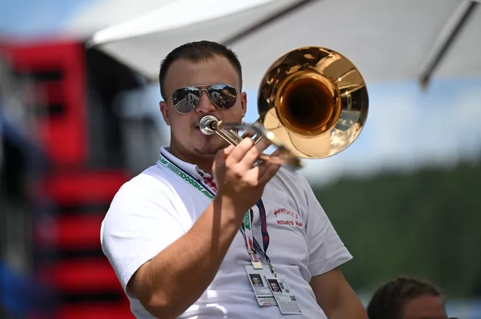 Musicians in the paddock.