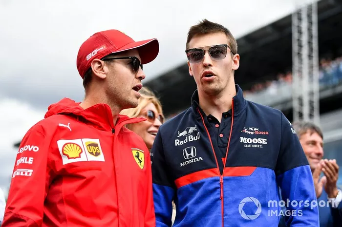 Sebastian Vettel, Ferrari, e Daniil Kvyat, Toro Rosso