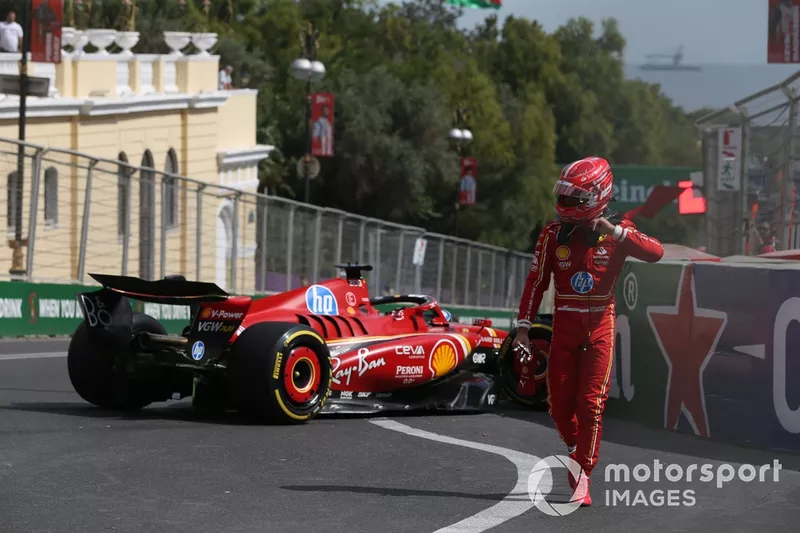 Charles Leclerc, Ferrari SF-24, walks away from the car after crashing into the barrier