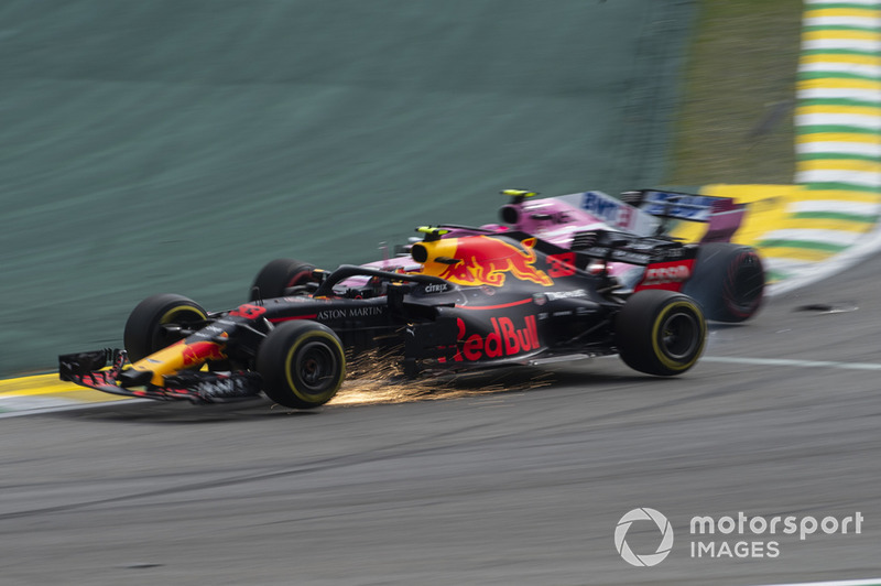 Race leader Max Verstappen, Red Bull Racing RB14 crashes whilst lapping Esteban Ocon, Racing Point Force India VJM11 