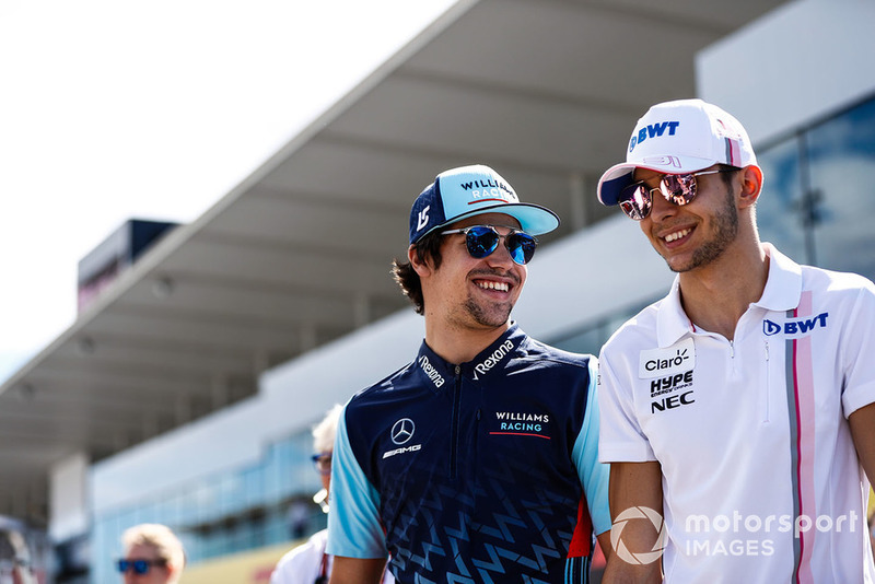 Lance Stroll, Williams Racing, with Esteban Ocon, Racing Point Force India