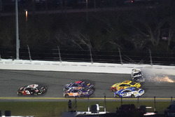 Austin Dillon, Richard Childress Racing Chevrolet Camaro leads as Aric Almirola, Stewart-Haas Racing Ford Fusion wrecks
