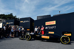 Pirelli reveal a mock up of what a 2017 F1 car and tyres may look like: Mario Isola, Pirelli Racing Manager with Gene Haas, Haas Automotion President and Maurizio Arrivabene, Ferrari Team Principal