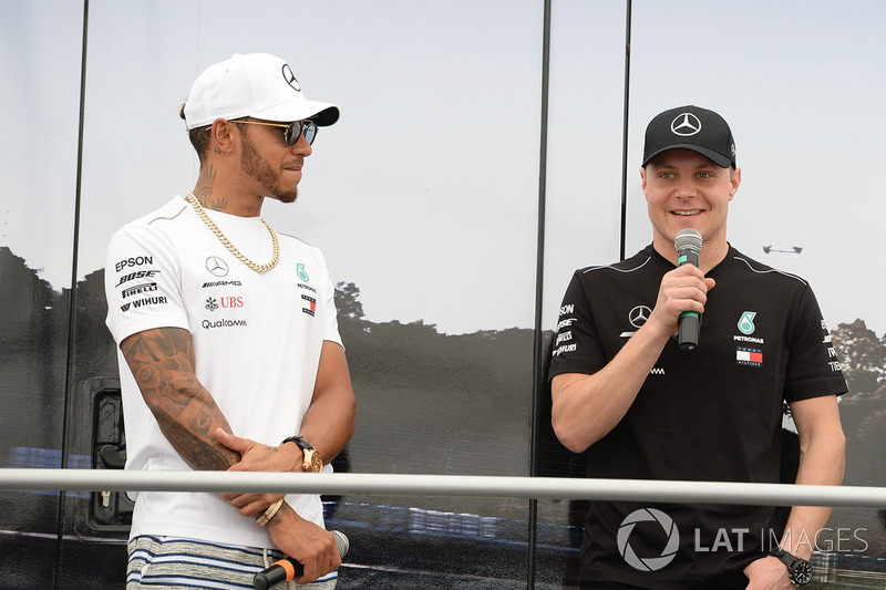 Lewis Hamilton, Mercedes-AMG F1 and Valtteri Bottas, Mercedes-AMG F1 on stage