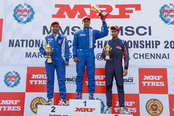 Race 2 podium: winner Karthik Tharani. second place Sandeep Kumar, third place Anindith Reddy