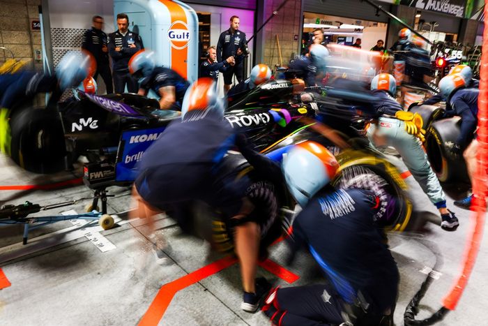 The Williams team practice pitstops