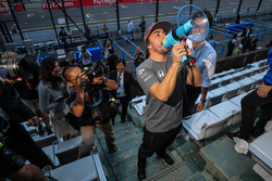 Fernando Alonso, McLaren talks to the fans using a megaphone