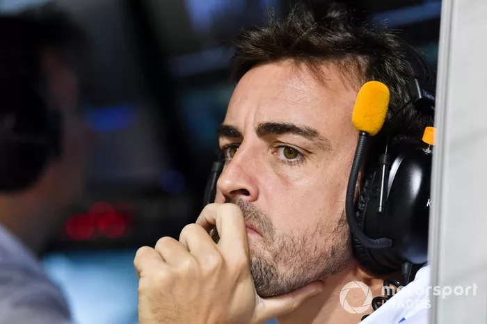 Fernando Alonso on the McLaren pit wall during Qualifying