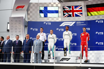 James Allison, Technical Director, Mercedes AMG, second place Valtteri Bottas, Mercedes AMG F1, Race winner Lewis Hamilton, Mercedes AMG F1, third palce Sebastian Vettel, Ferrari, on the podium behind Viktor Kiryanov, Head of State Motor Vehicle Inspectorate of Ministry of Internal Affairs, Dimitry Kozak, Deputy Prime Minister of Russia, Andrey Kostin, President and Chairman of the Management Board of VTB Bank, and Vladimir Putin, President of Russia