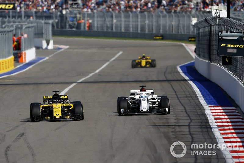 Nico Hulkenberg, Renault Sport F1 Team R.S. 18 and Marcus Ericsson, Sauber C37
