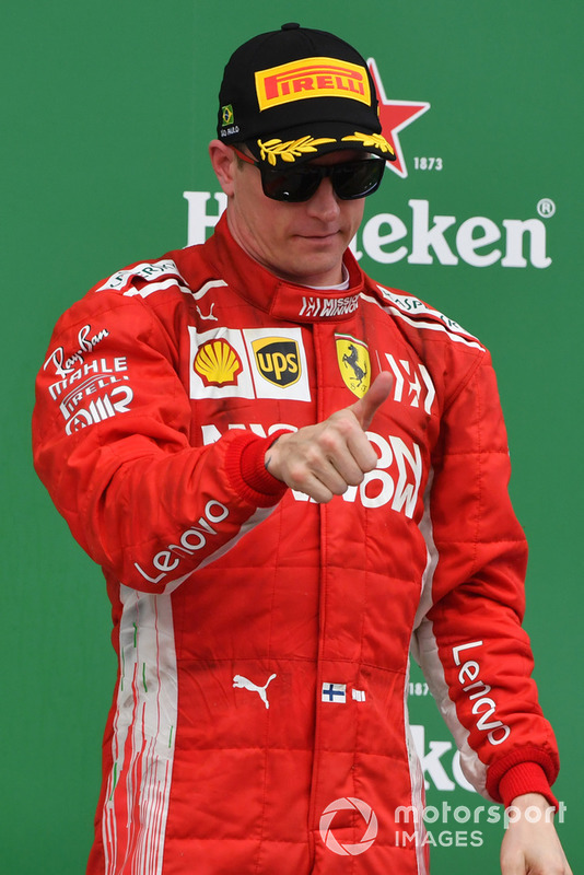 Kimi Raikkonen, Ferrari, festeggia sul podio