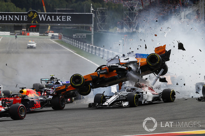 Fernando Alonso, McLaren MCL33, crashes over Charles Leclerc, Sauber C37, after contact from Nico Hulkenberg, Renault Sport F1 Team R.S. 18, at the start