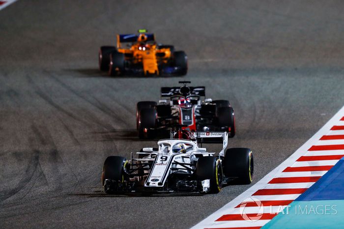 Marcus Ericsson, Sauber C37 Ferrari, Romain Grosjean, Haas F1 Team VF-18 Ferrari, and Stoffel Vandoorne, McLaren MCL33 Renault