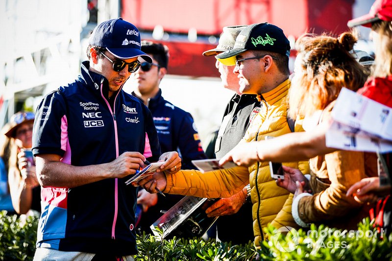 Sergio Perez, Racing Point signs an autograph for a fan