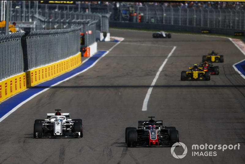 Romain Grosjean, Haas F1 Team VF-18 and Marcus Ericsson, Sauber C37