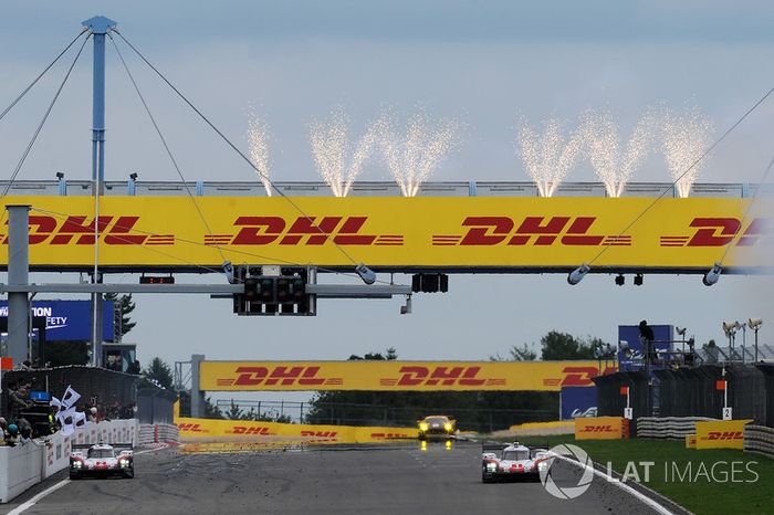#2 Porsche Team Porsche 919 Hybrid: Timo Bernhard, Earl Bamber, Brendon Hartley takes the checkered flag and the win in front of #1 Porsche Team Porsche 919 Hybrid: Neel Jani, Andre Lotterer, Nick Tandy