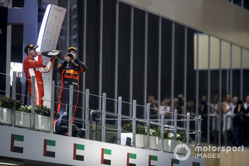 Sebastian Vettel, Ferrari e Max Verstappen, Red Bull Racing, festeggiano sul podio