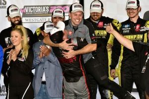 Christian Eckes, ThorSport Racing, Toyota Tundra Curb Records celebrates his win in Victory Lane