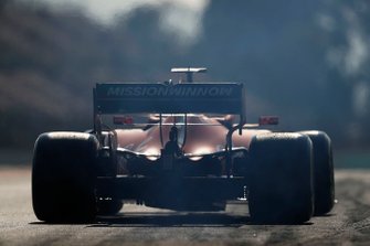 Smoke from the rear of Charles Leclerc, Ferrari SF90