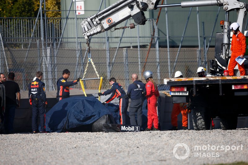 The crashed car of Pierre Gasly, Red Bull Racing RB15 is recovered