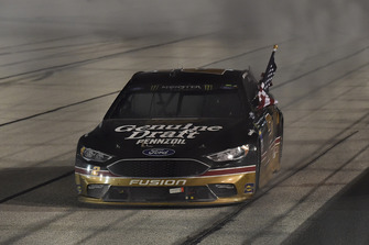 Brad Keselowski, Team Penske, Ford Fusion Miller Genuine Draft celebrates his win