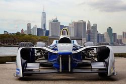 A Formula E car with the New York City skyline