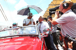 Lewis Hamilton, Mercedes AMG F1 with Johnny Herbert, Sky Sports F1 Presenter on the drivers parade