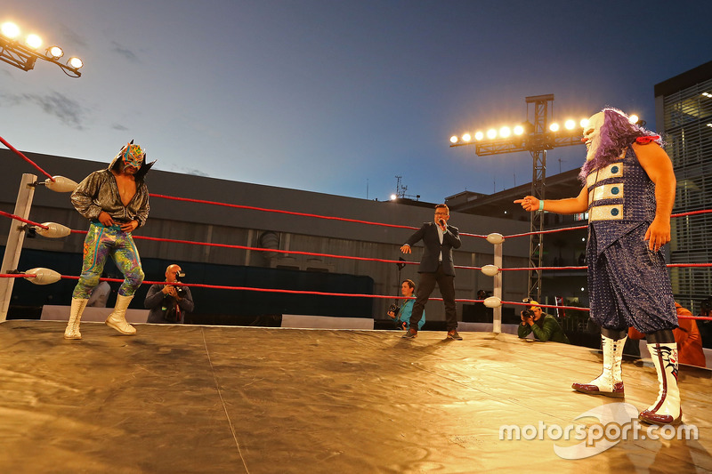 Mexican wrestlers in the paddock