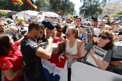 Daniel Ricciardo, Red Bull Racing signs autographs for fans