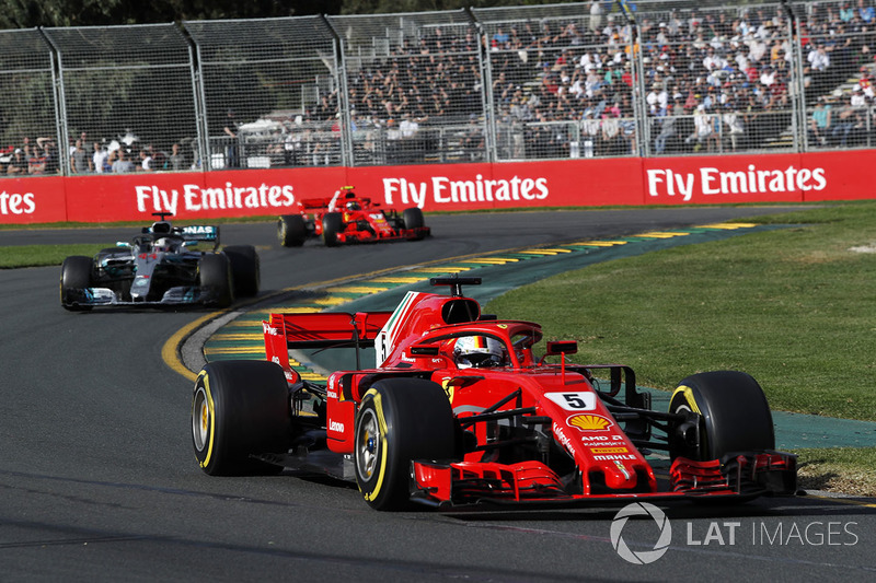 Sebastian Vettel, Ferrari SF71H leads Lewis Hamilton, Mercedes-AMG F1 W09