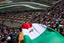 Sergio Perez, Sahara Force India VJM10 passes Mexican flag in the grandstand