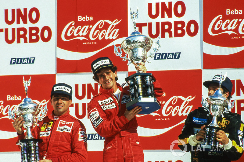 Podium : le vainqueur Alain Prost, McLaren, le deuxième Michele Alboreto, Ferrari, le troisième Elio De Angelis, Lotus