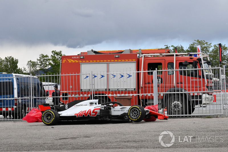 The crashed car of race retiree Romain Grosjean, Haas F1 Team VF-18