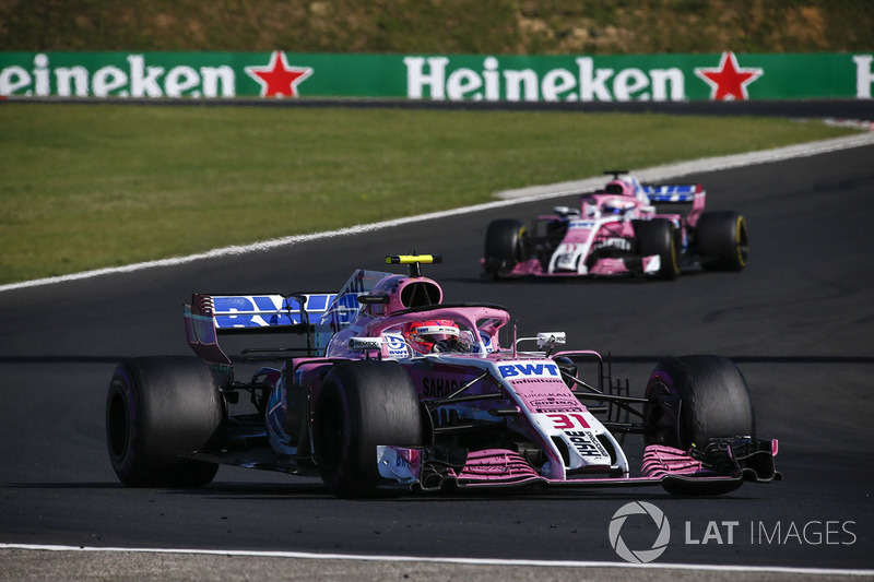 Esteban Ocon, Force India VJM11, leads Sergio Perez