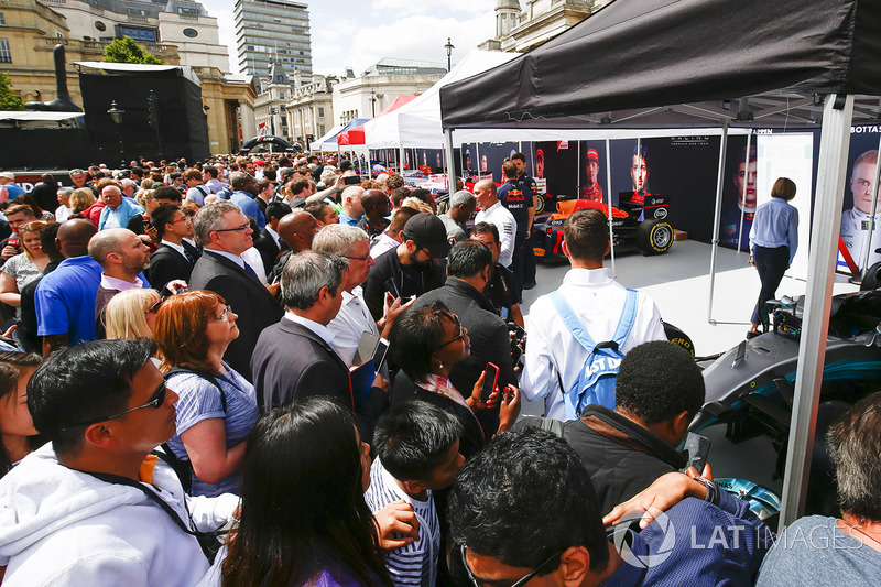 Fans gather around the display stands