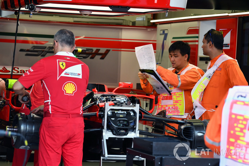 Ferrari SF70H in the garage and Scrutineers