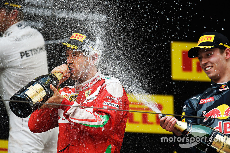 Podium: second place Sebastian Vettel, Ferrari and third place Daniil Kvyat, Red Bull Racing