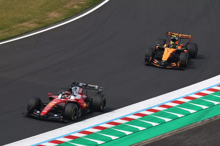 Charles Leclerc, Ferrari; Lando Norris, McLaren