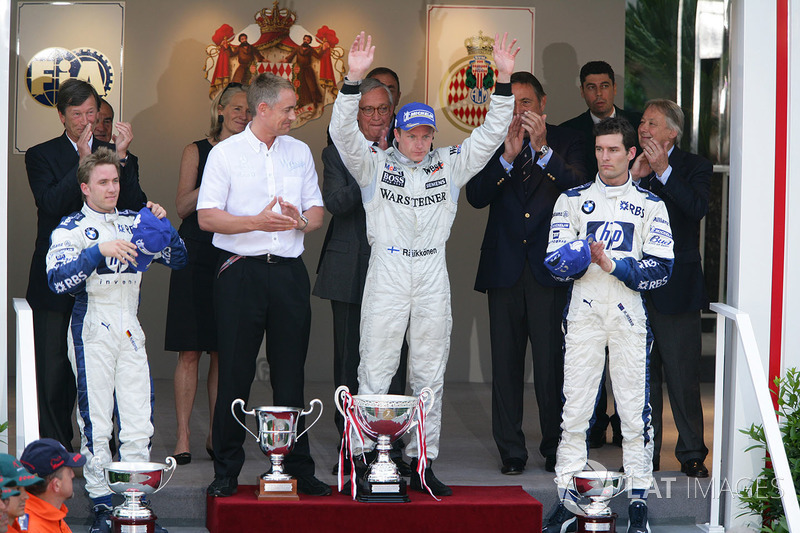 Podium: race winner Kimi Raikkonen, McLaren, second place Nick Heidfeld, Williams, third place Mark Webber, Williams