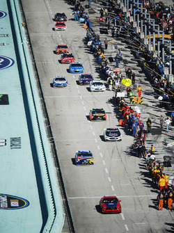 The cars leave pit road
