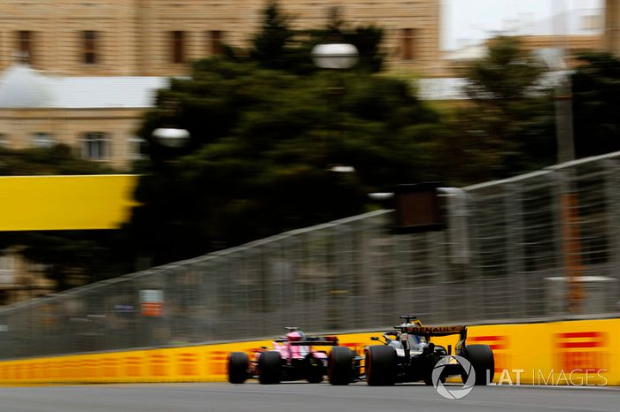 Sergio Perez, Force India VJM11 Mercedes, leads Nico Hulkenberg, Renault Sport F1 Team R.S. 18