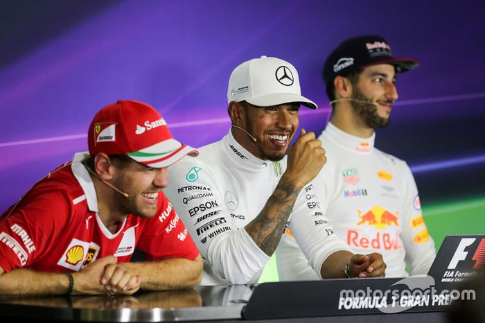 Sebastian Vettel, Ferrari, Lewis Hamilton, Mercedes AMG F1 and Daniel Ricciardo, Red Bull Racing