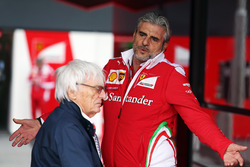 (L to R): Bernie Ecclestone, with Maurizio Arrivabene, Ferrari Team Principal
